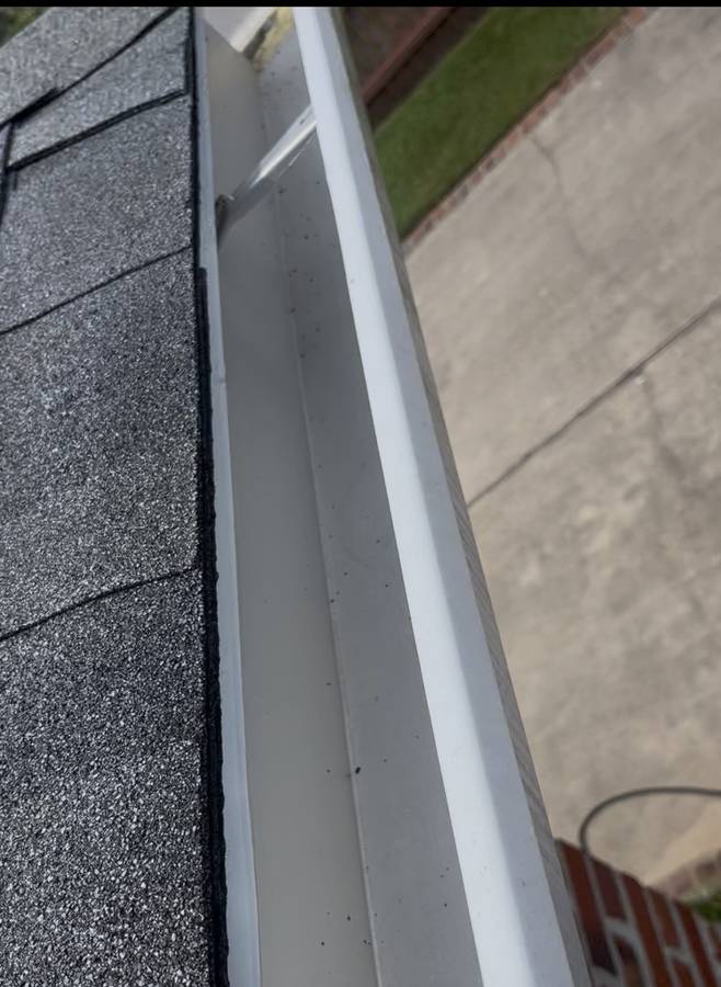 Spotless clean white gutter run